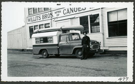 Canoe on Truck in Front of Willits Canoe Factory, Day Island, Tacoma, Washington March 1961