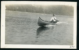 C. Alexander in Canoe Powered by a Johnson Outboard Motor, 1924