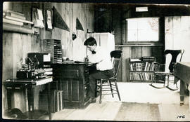 Earl Willits in the Office of the Willits Brothers Canoe Manufacturing Shop in Artondale, Washing...