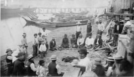 Members of Puyallup Tribe playing game on shores of Puget Sound
