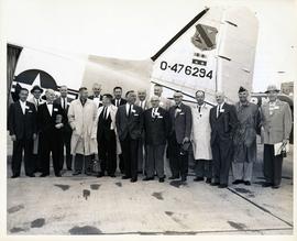 Tollefson and Others in Front of a Plane